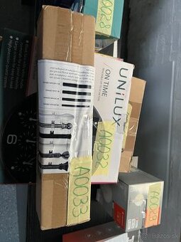 Sada držiakov a koncoviek na záclonové tyče, čierny kov