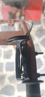 Motorový štvor taktový kultivátor.