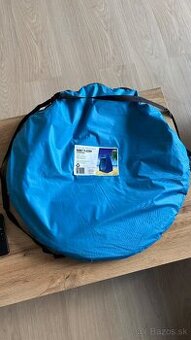 Prezliekací stan Nový