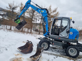 Kolesové rýpadlo Wacker Neuson EW100 11 ton s 3 ramenami a