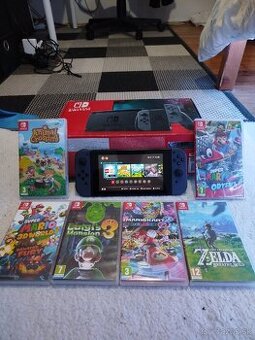 Nintendo Switch + 6 Hier