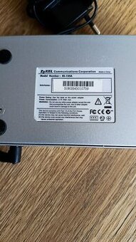 Predám switch zyxel 105a
