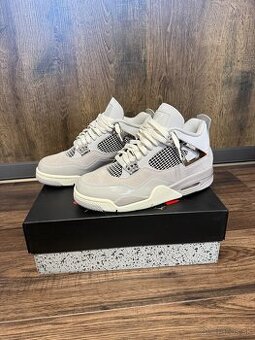 Jordan 4 frozen moments