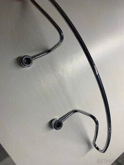 Držiak na sako VW Sharan