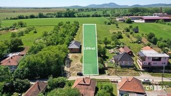 CREDA | predaj stavebný pozemok Sľažany okres ZM
