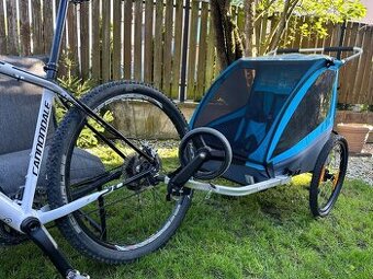 Cyklovozík Thule pre dve deti + Horský bicykel Cannondale