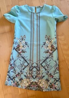 nove saty Oasis