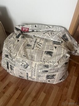 Predám koženný tulivak s motívom novín
