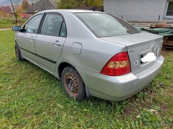 Predám dvere airbagy Kufor Sklo Svetlo Corolla E12 sedan 02-