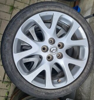 Predám hliníkové disky Mazda 18