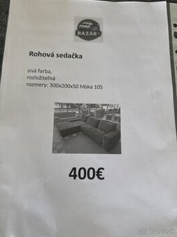 Rohová rozkladacia sedačka – sivá