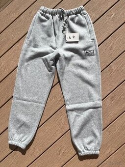Teplaky dlhé NIKE Stüssy sivé M
