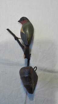 Starý dřevěný ptáček na zeď