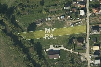 Stavebný pozemok v obci Petrovany-10 min. od centra Prešova