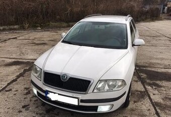 Rozpredam Skoda Octavia 2 1,6i 65kw farba biela 1026,