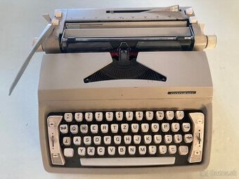Písací stroj s kufríkom