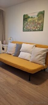 Ikea nyhamn rozkladacia pohovka s pérovými vankúšmi