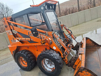 Predam Smykovy nakladac unc locust 752