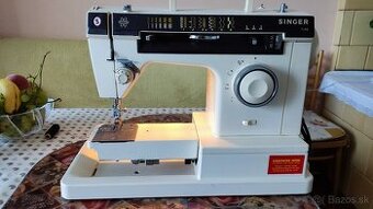 Kufrikovy šijací stroj Singer