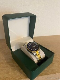 Rolex Submariner - Oystersteel, yellow gold
