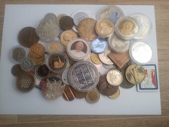 Medaile,plakety,źetony.