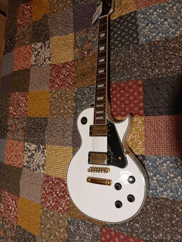 Elektrická gitara VINTAGE V100 NOVÁ + kábel