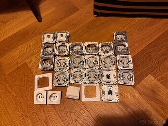 Elektricke zasuvky a stroje vypinacov Schneider