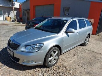 Rozpredam Skoda Octavia 2Facelift 1,6tdi 77kw farba striebor