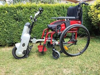 Prídavný elektrický pohon na invalidný vozík