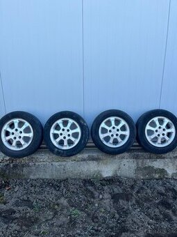 Sada Aludisky 6JX15H2 ET43 s Michelin pneu na Opel Zafira