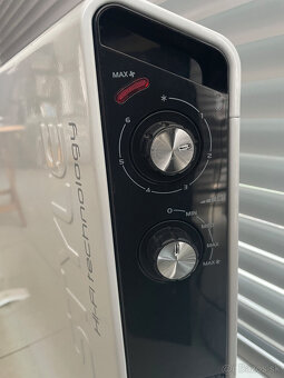 Teplovzdušný konvektor DE LONGHI HCX3120FS (Ohrievač)