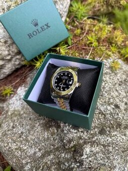 Hodinky Rolex Datejust | 36mm | Black/Gold Dial