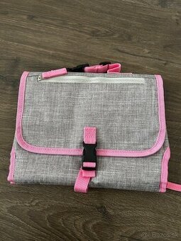 Cestovná prebaľovacia podložka