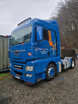 Man TGX 18 440, náves Schmitz