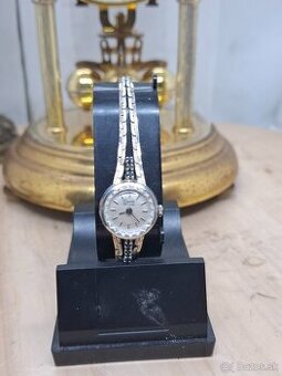 Predám funkčné strieborné dámske hodinky Quartz DE LUXE