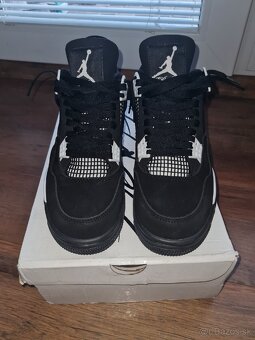 Air Jordan 4 White Thunder OG