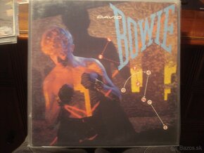 LP BOWIE COCKER B.HOLLY FOREIGNER ELO BYRDS E.JOHN MADONNA