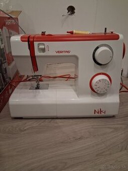 Látky a šijací stroj predám