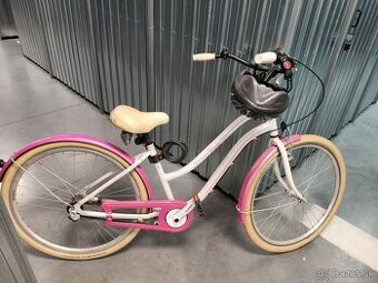 Mestský ružovy bicykel
