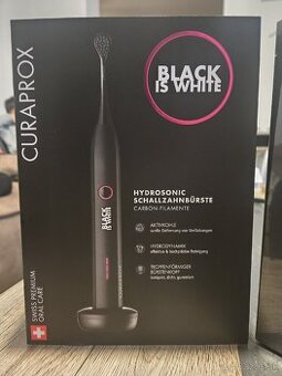 Elektronická zubná kefka Curaprox Black is White