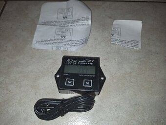 Merač motohodin, ukazovateľ otačok.