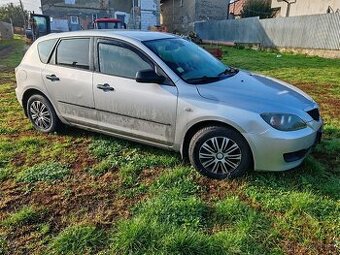 Mazda 3 1.4 benzín  62kw - 1