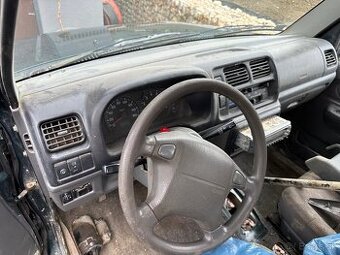 Palubovka a volant Suzuki jimny