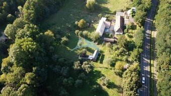 Pozemok (10 000m2) s viacerými budovami vo Veľkom Krtíši