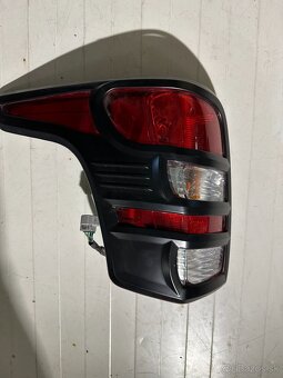 Zadné ľavé svetlo Fiat Fullback s rámom 8330A943
