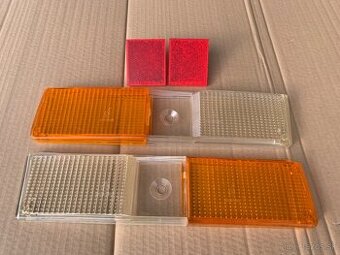 Spodné časti krytov svetiel škoda 105/120/125/garde/rapid