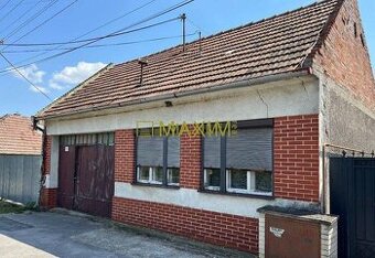 Dom a krásny veľký rovinatý pozemok v obci Dolné Orešany