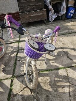 Detský bicykel s aj bez pomocných koliesok