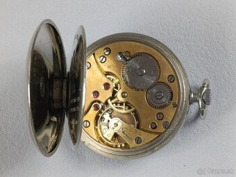 Kapesní hodinky DOXA s medailema. Erotika, erotický motiv