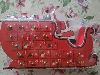 Adventny kalendar - 
Santa na saniachSanta na saniach